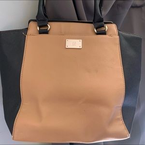 No color man made leather purse in fair condition.